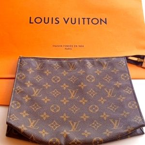 Authentic Louis Vuitton clutch purse / make up bag. Excellent condition. 8x10"